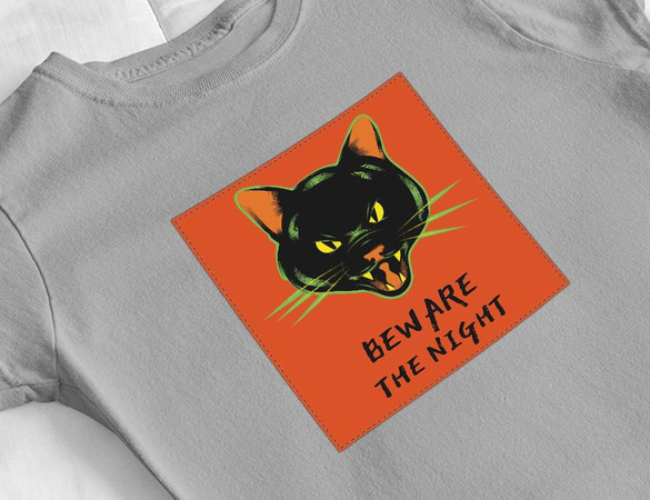 Bluzka damska z naszywką Beware the night